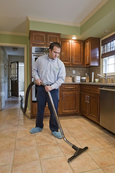 Man Cleaning Tile & Grout